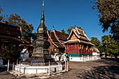 Wat Xieng Thong temple in Luang Prabang, Laos. Small 'that' (stupa) inside the temple precinct. 